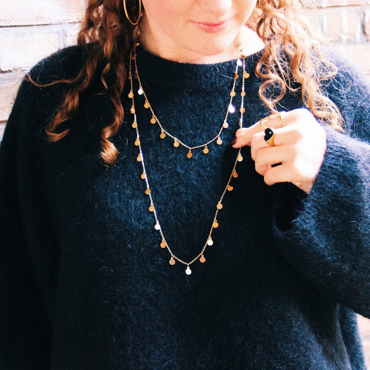 Lange ketting met dubbele munt