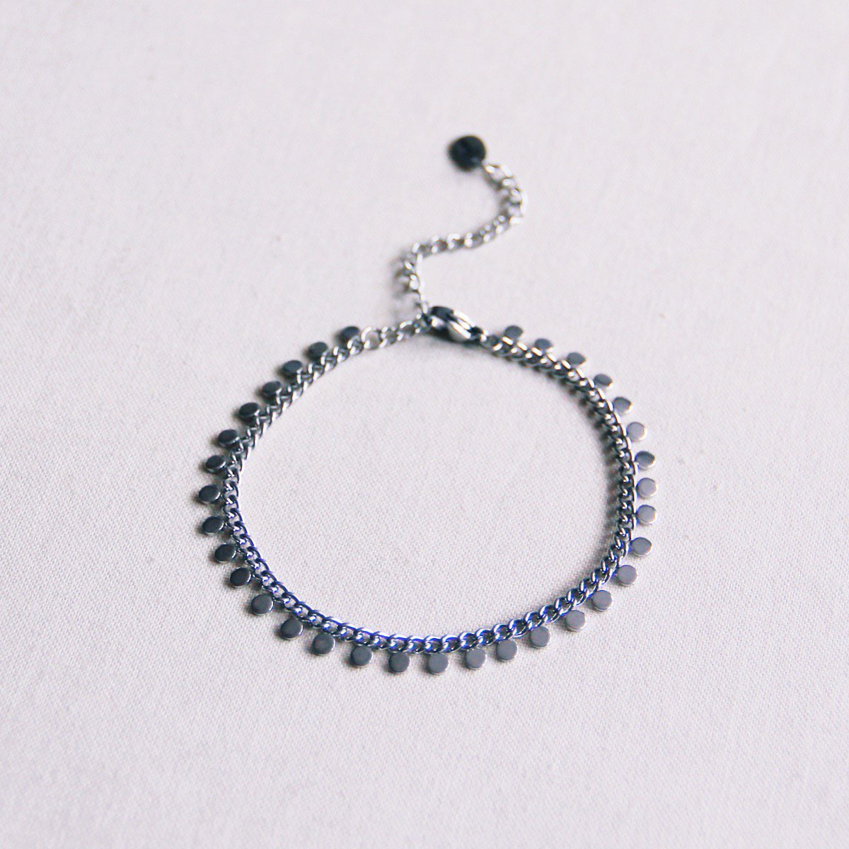 BAZOU Stalen schakelarmband met muntjes - zilver