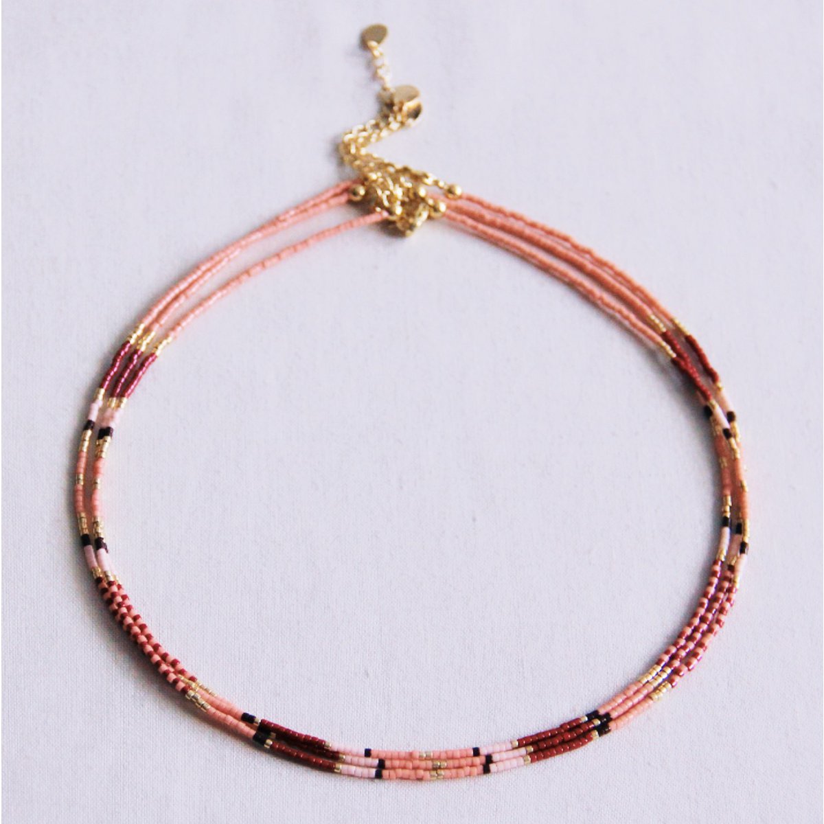 Kralen ketting roze/borderladen/naakt