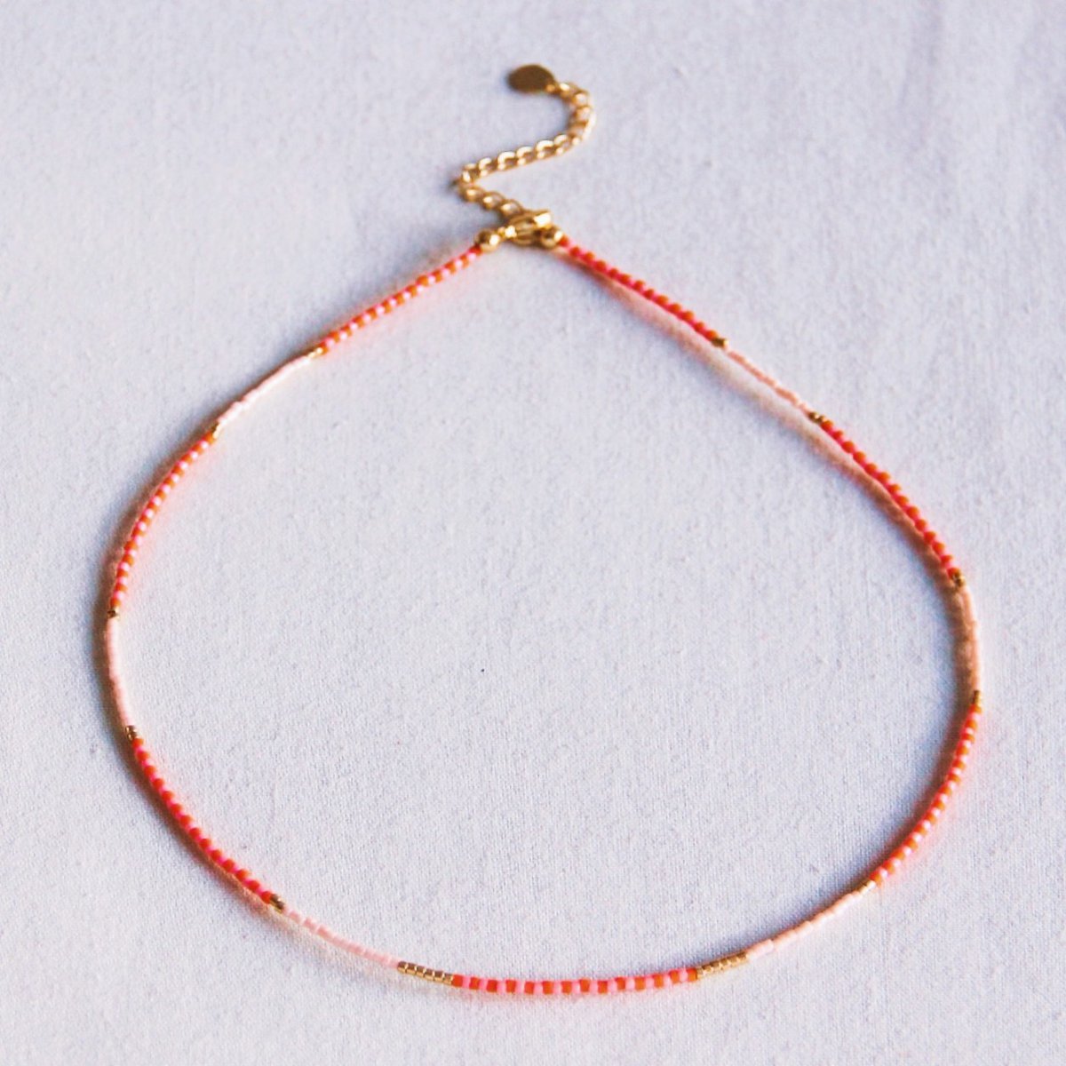 Kralen ketting oranje/roze/naakt