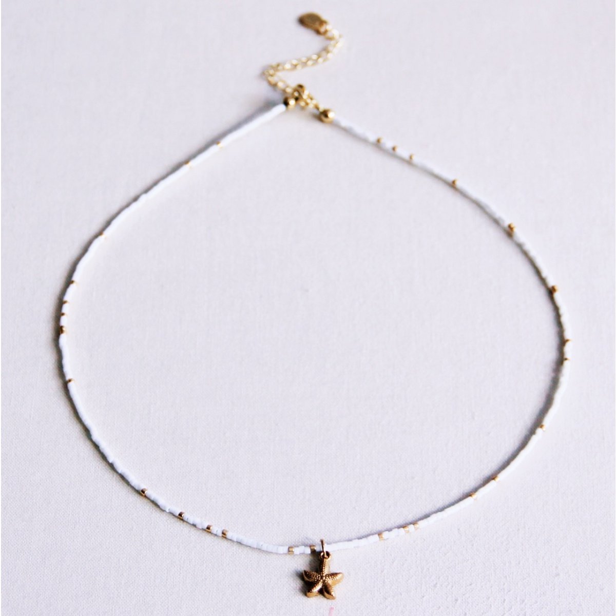 Kralen ketting met zeester - wit