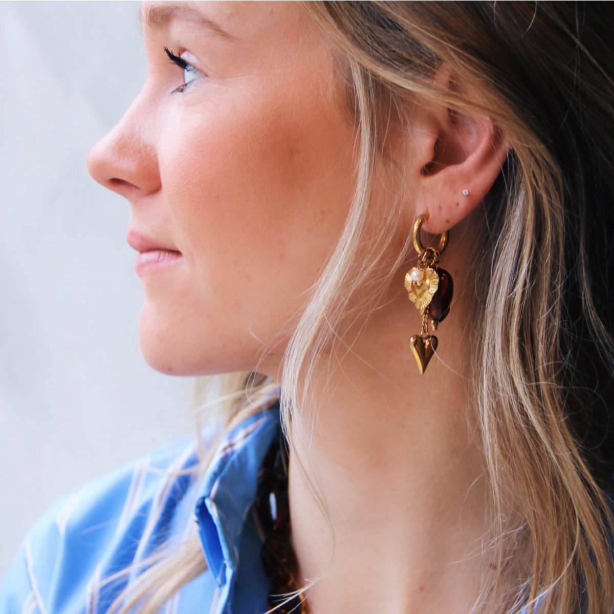 RVS ring met nugget, hartjes en parel - bruin/goud