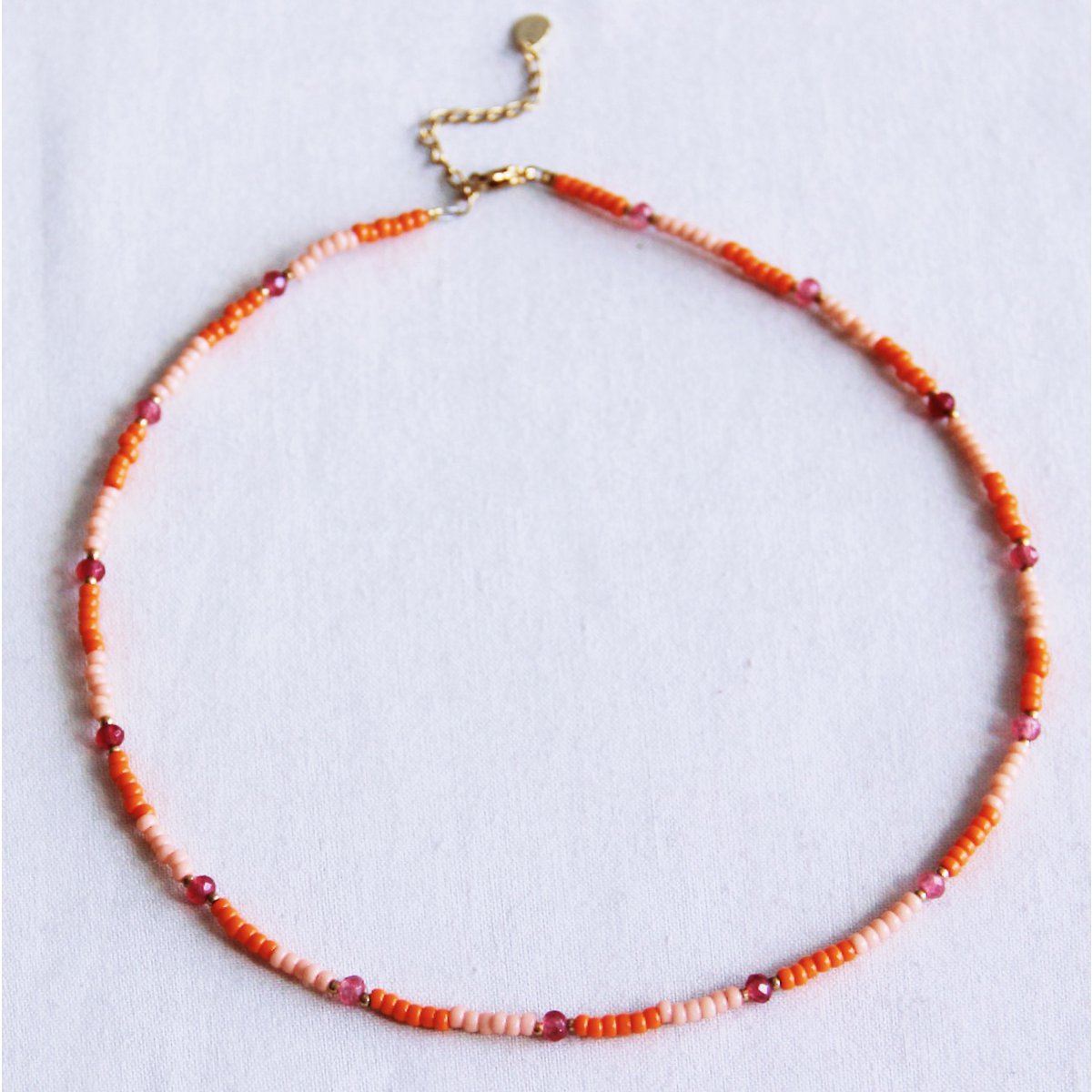 BAZOU Kralen ketting met facet - sinaasappel/zalm/roze