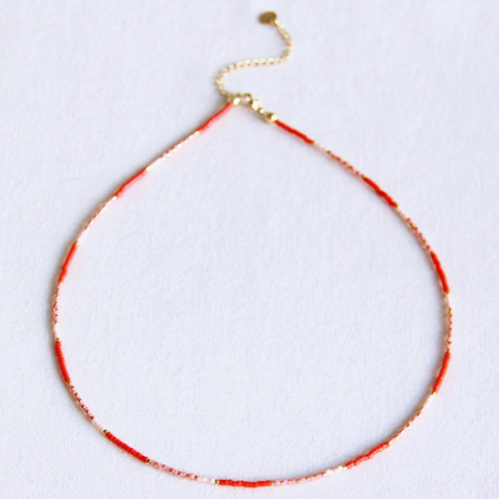 BAZOU Kralen ketting rood/roze/naakt