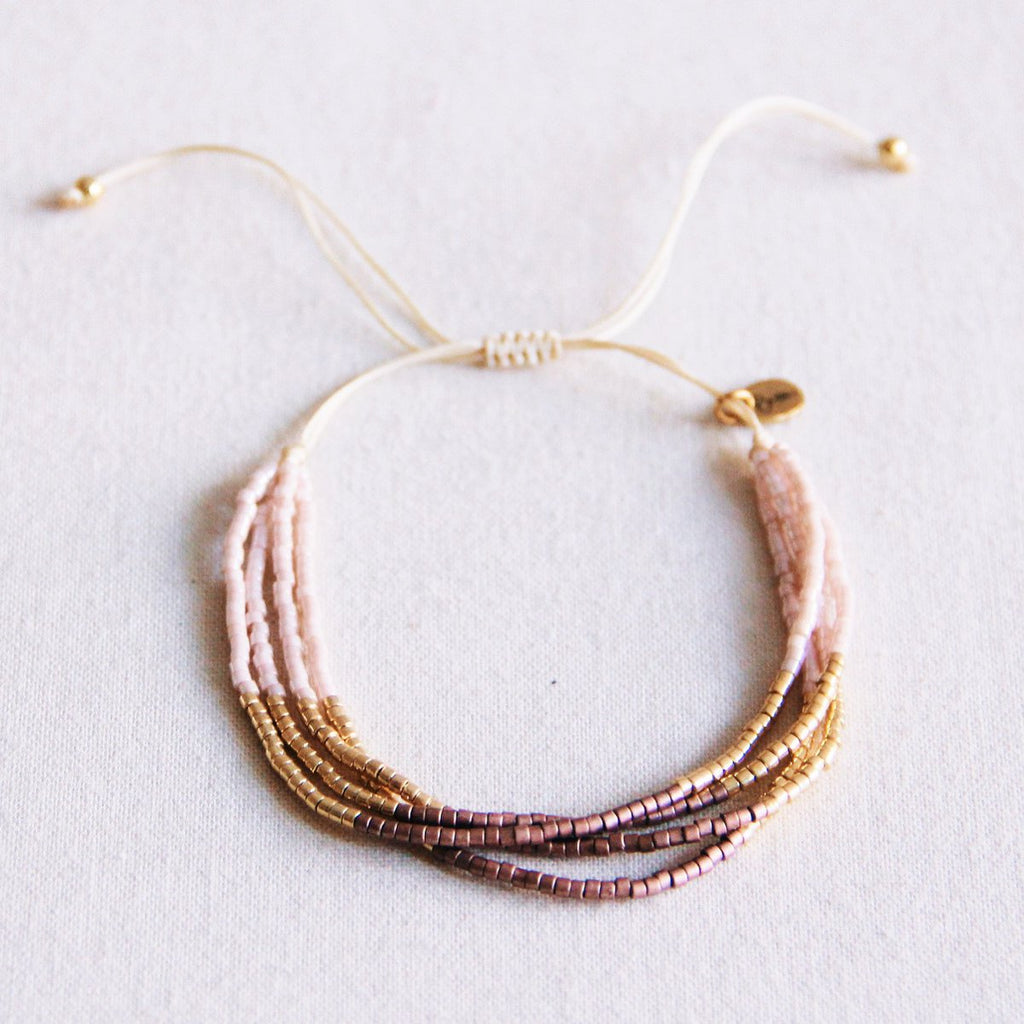 Viervoudige Miyuki -armband - naakt/taupe/goud vergulde