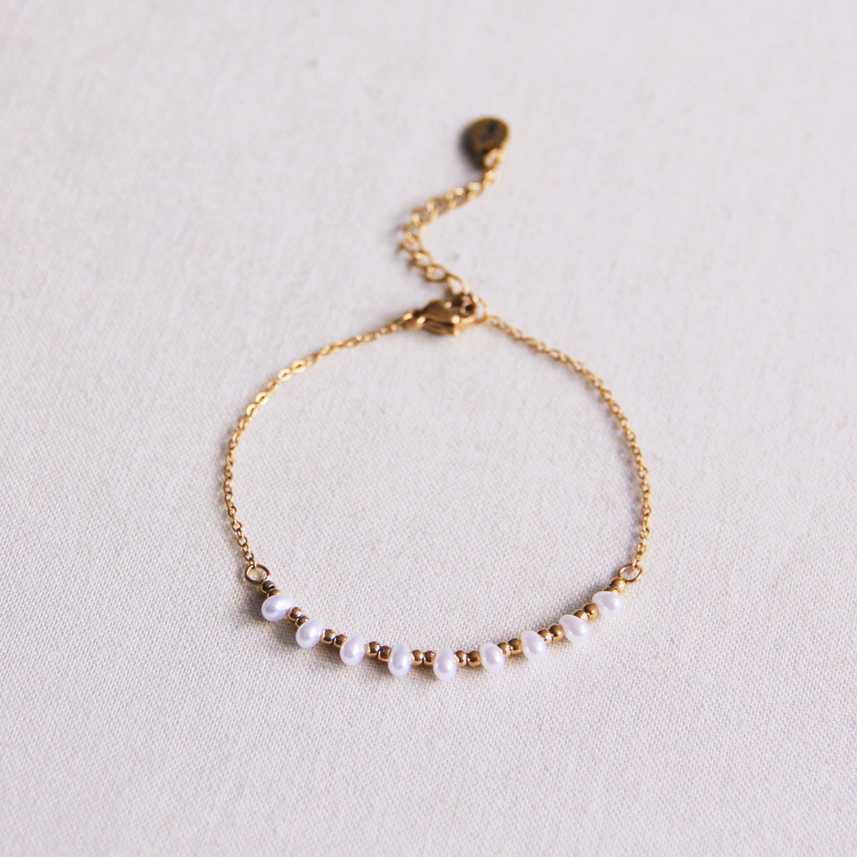 Fijne roestvrijstalen armband met mini -parels en kralen