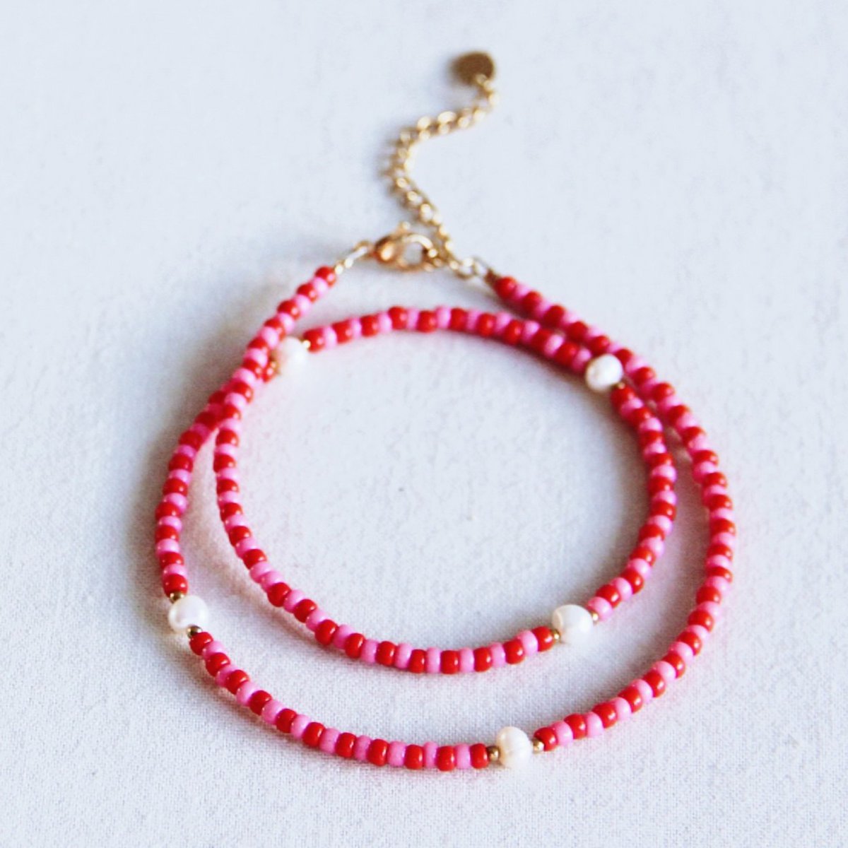 Kralen ketting met parels - rood/roze