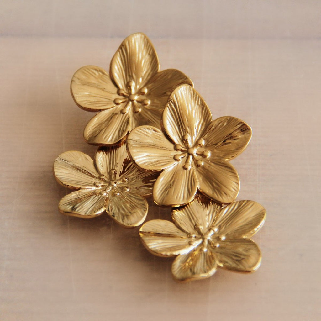BAZOU RVS statement oorbel 2 bloemen - goud