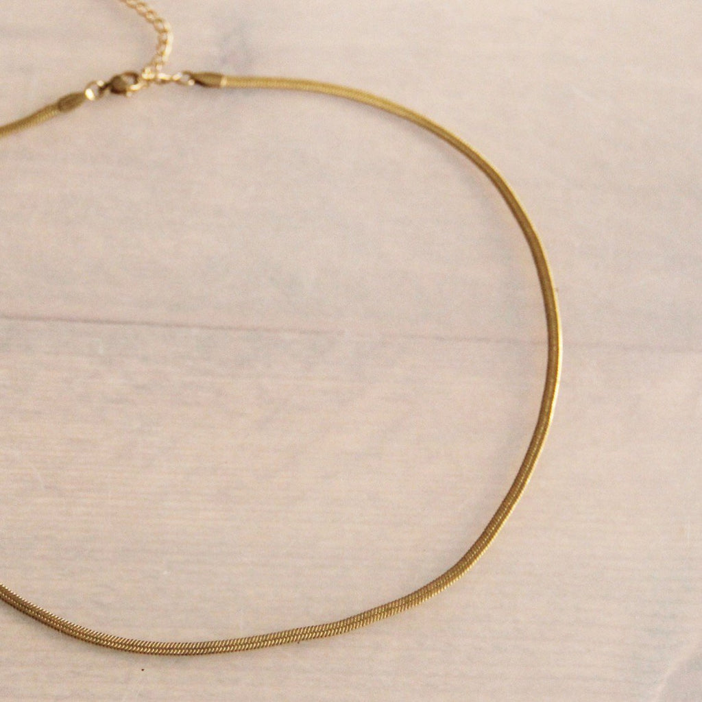 Platte “Snake” ketting 3mm - goudkleur