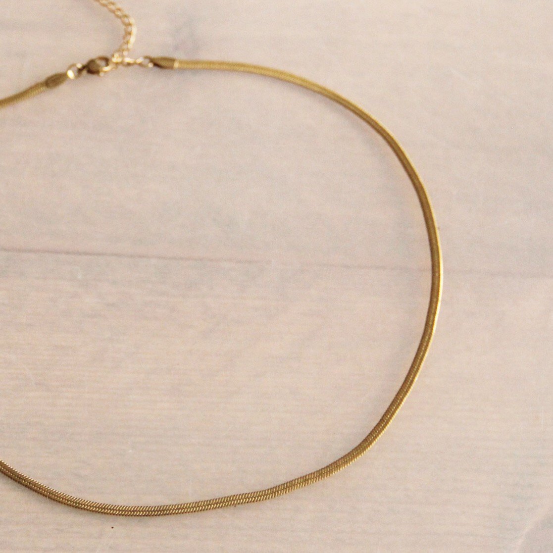Platte “Snake” ketting 3mm - goudkleur