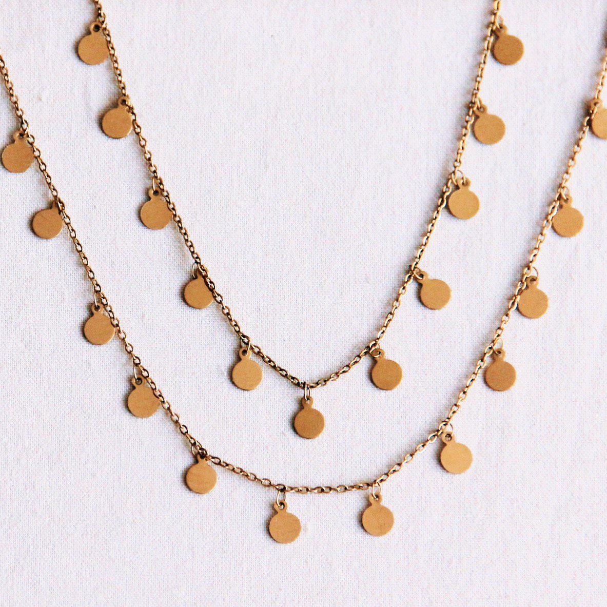 Lange ketting met dubbele munt