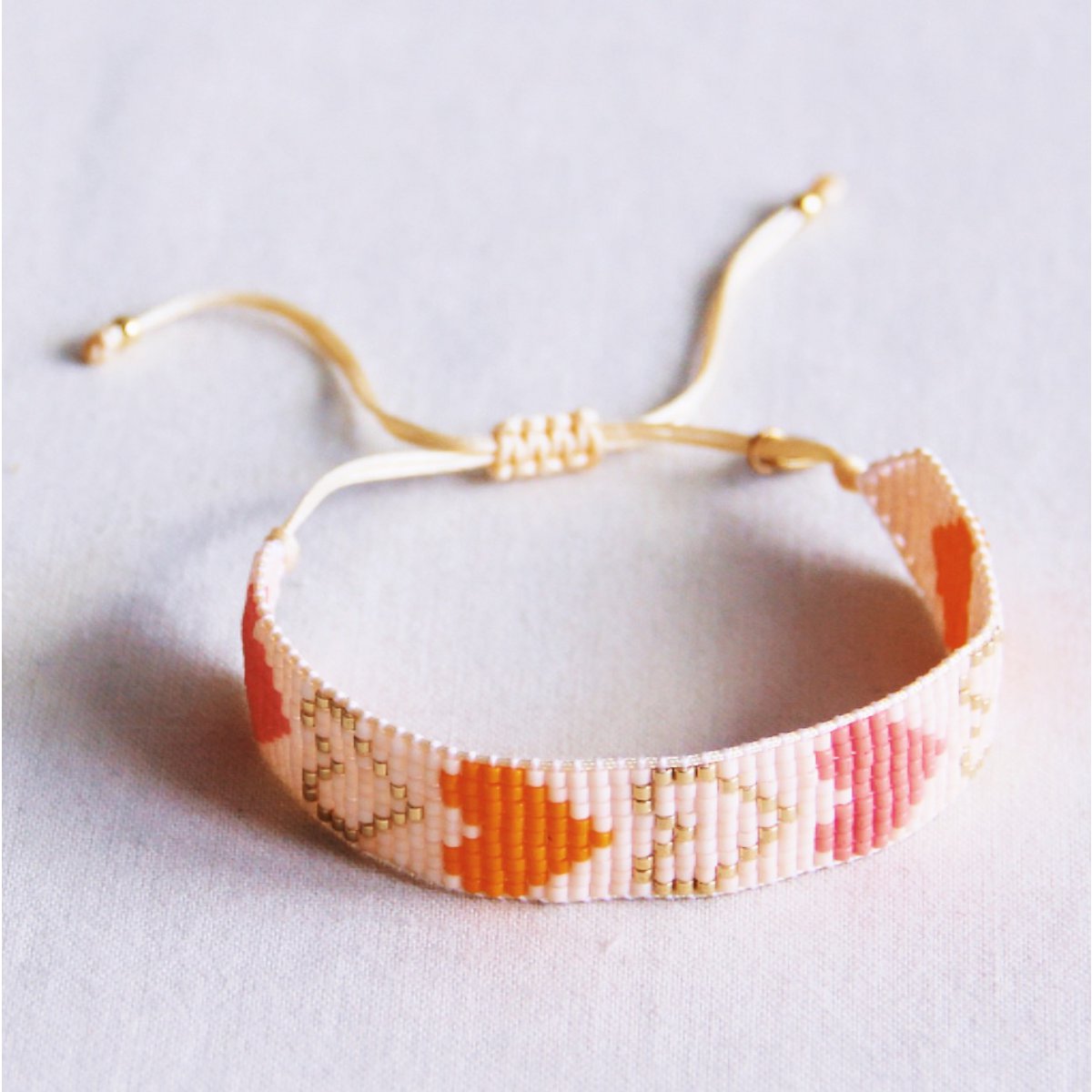 Hart geweven armband - naakt/oranje/zalm