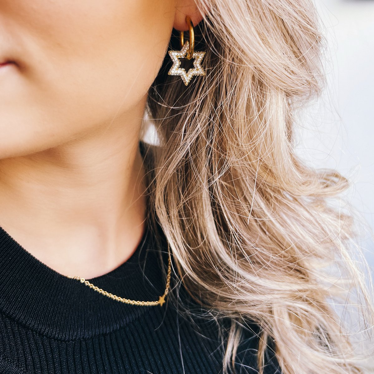 BAZOU Edelstalen oorringen met kristallen ster - wit/goud