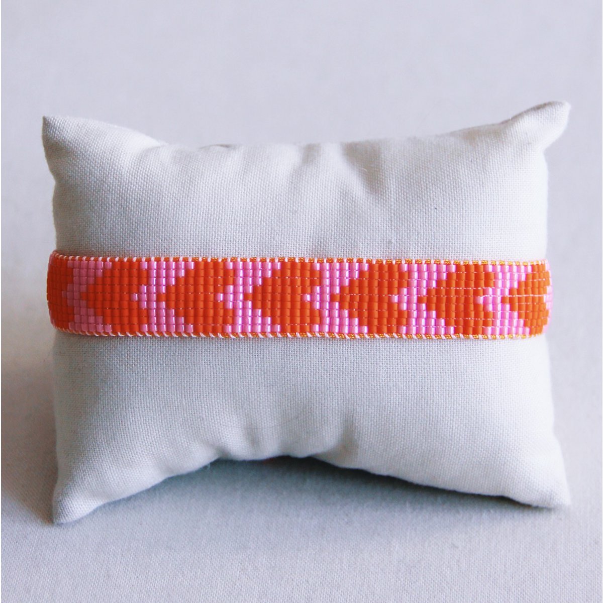 BAZOU RVS Weef armband met harten - roze/oranje
