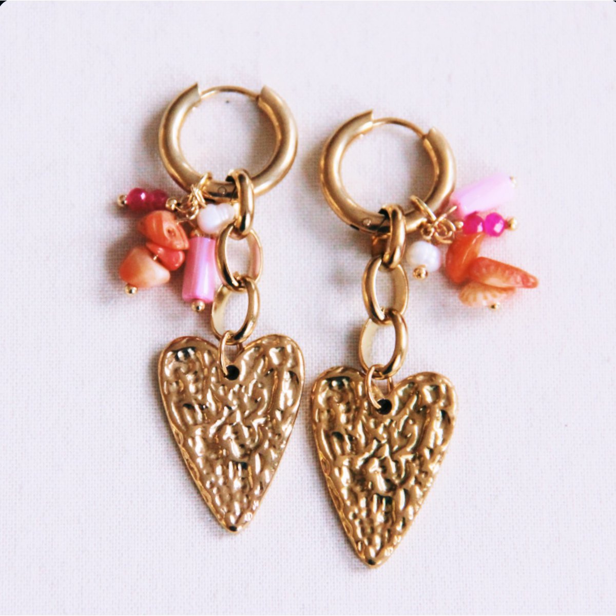Brede roestvrijstalen ring met ketting, hart en cluster - roze/oranje