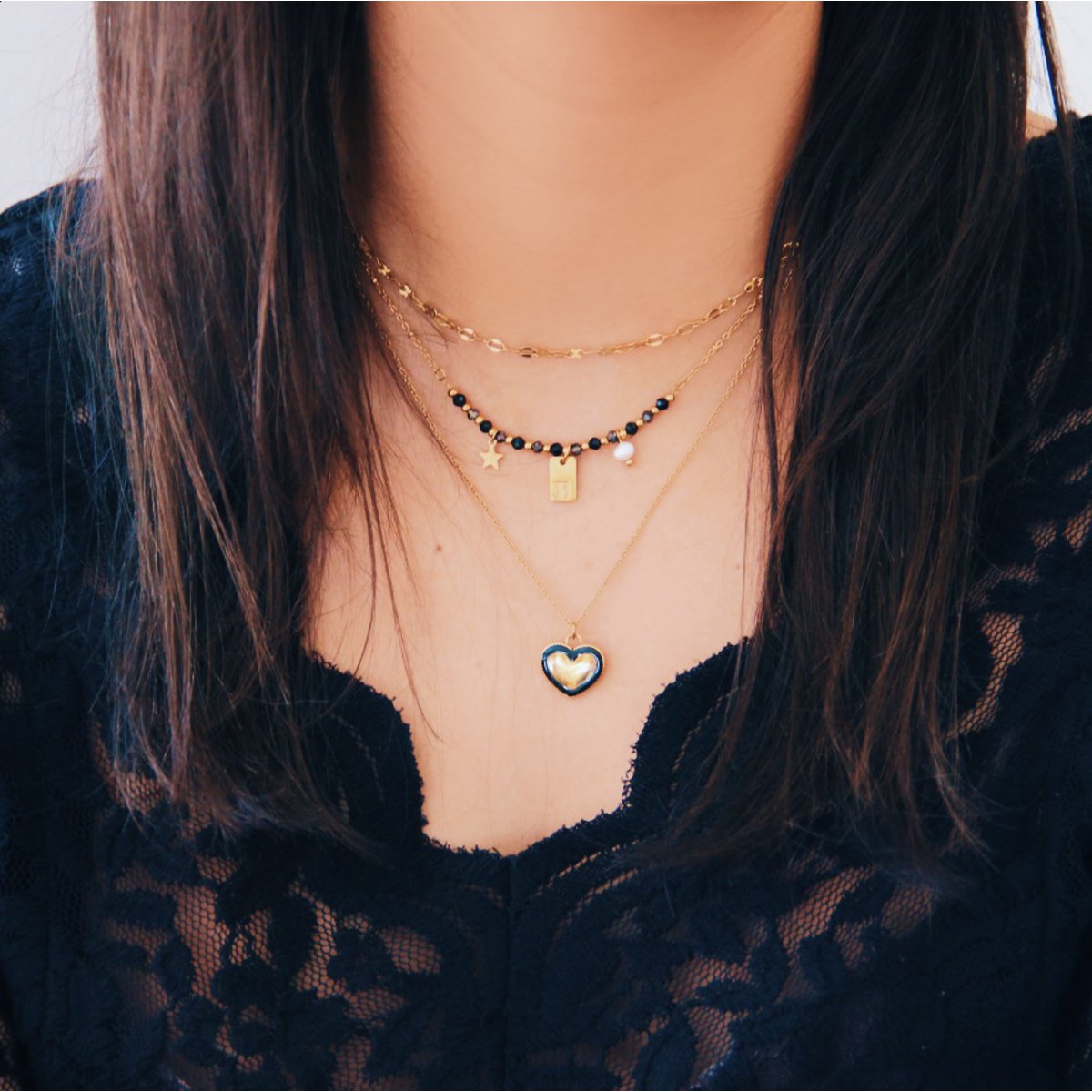 BAZOU Fijne ketting met gestippeld hartje - goud/zwart