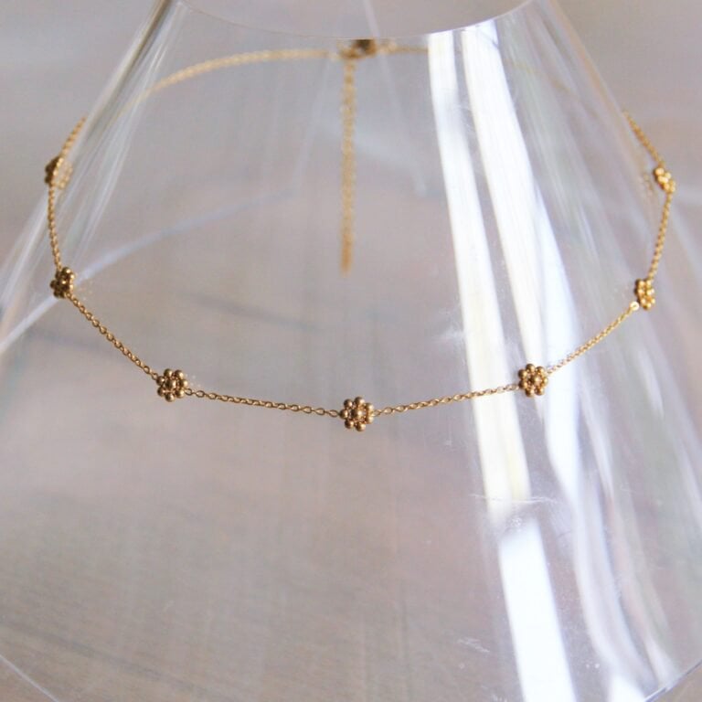 BAZOU RVS ketting met fijne madeliefjesbloemen - goud