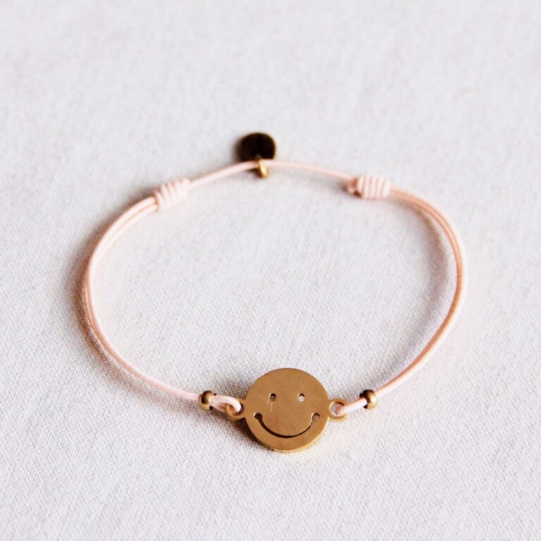 BAZOU Elastiek armbandje met smiley – perzik/goud